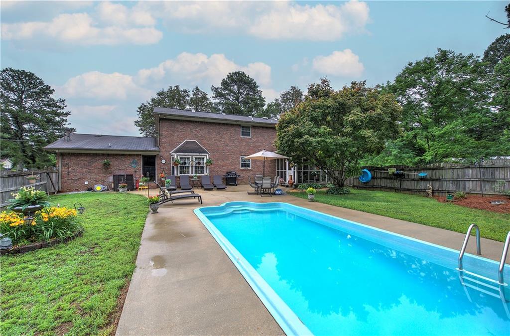 3637 Nebo Road Hiram, GA 30141 - Photo 56 of 63 a front view of house with yard and outdoor seating