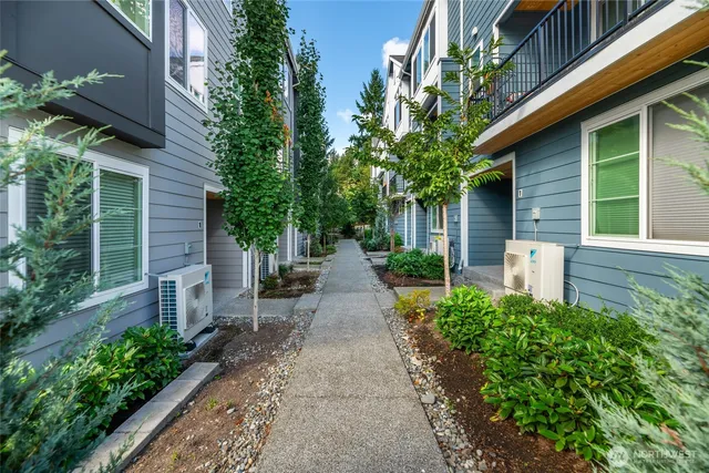 a view of a pathway with a house