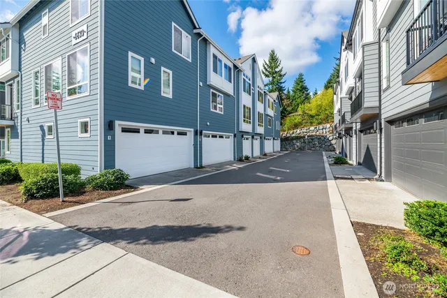 a view of a building with a street