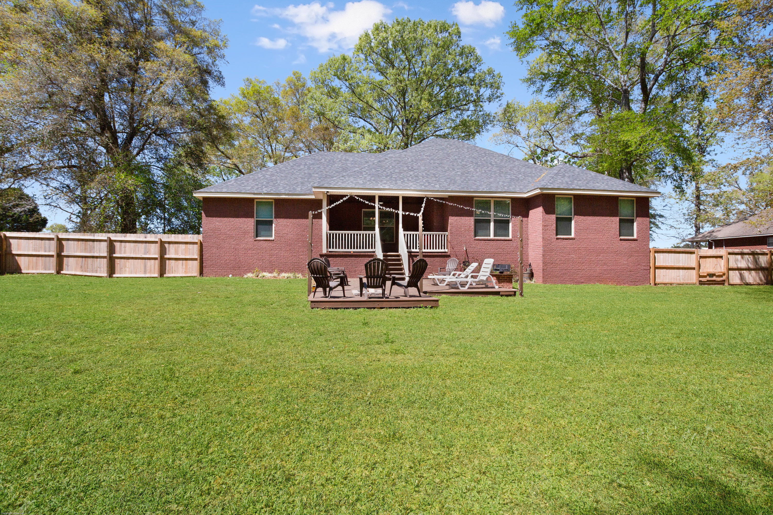 5887 Oak Hill Road Crestview, FL 32536 - Photo 29 of 44 a front view of house with yard and trees
