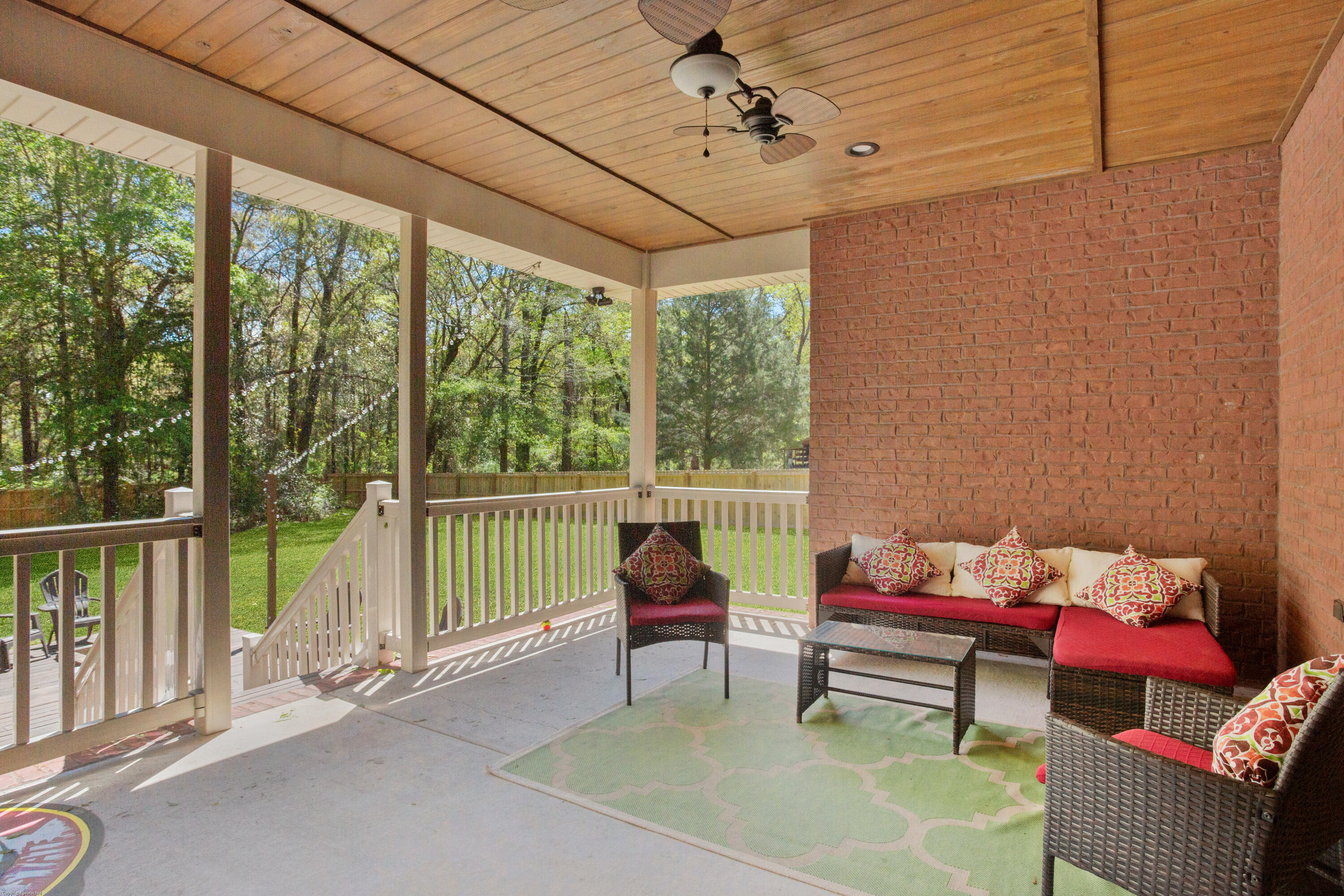 5887 Oak Hill Road Crestview, FL 32536 - Photo 3 of 44 a room with furniture and a large window