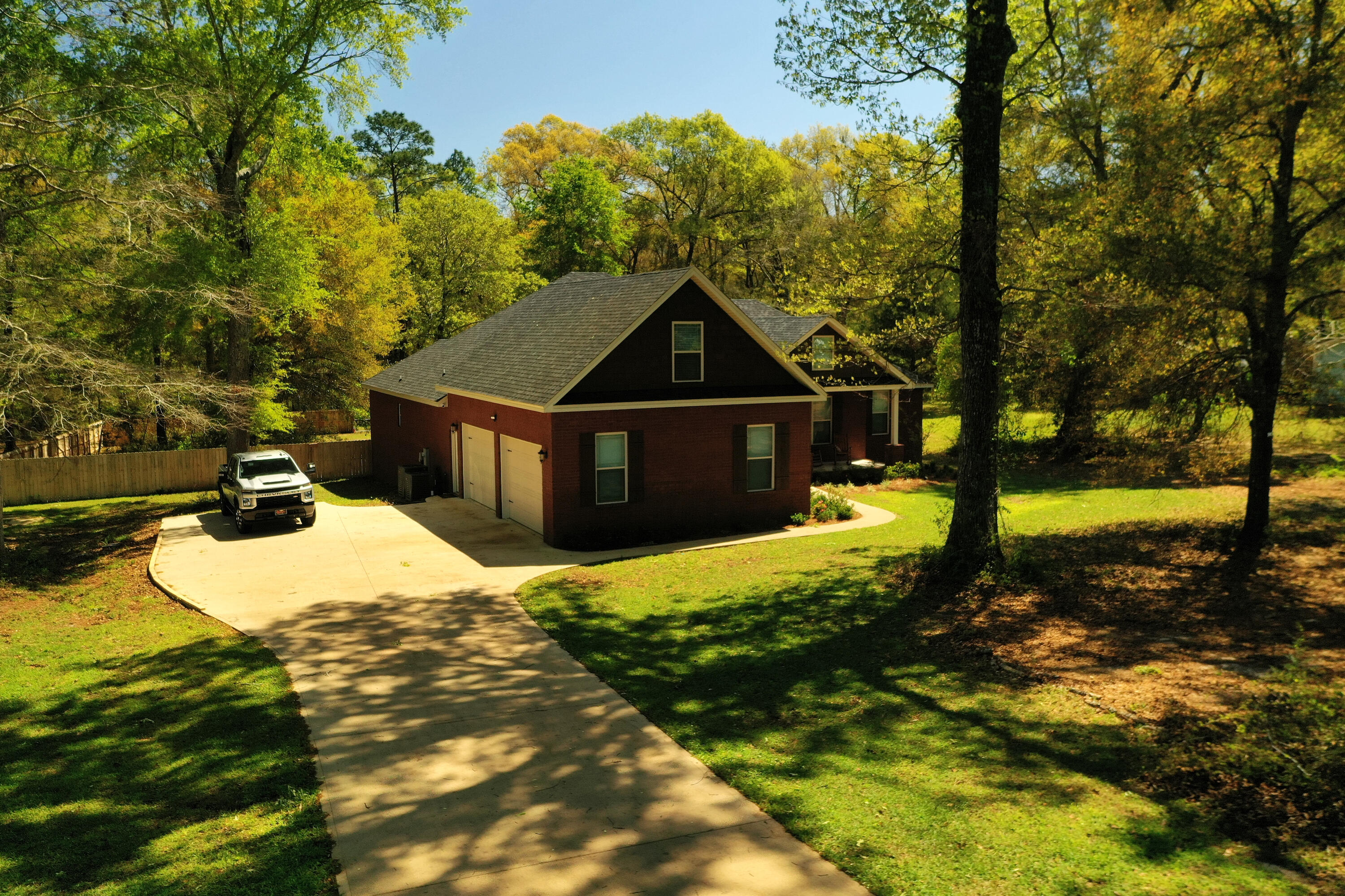 5887 Oak Hill Road Crestview, FL 32536 - Photo 36 of 44 a view of a house with a yard