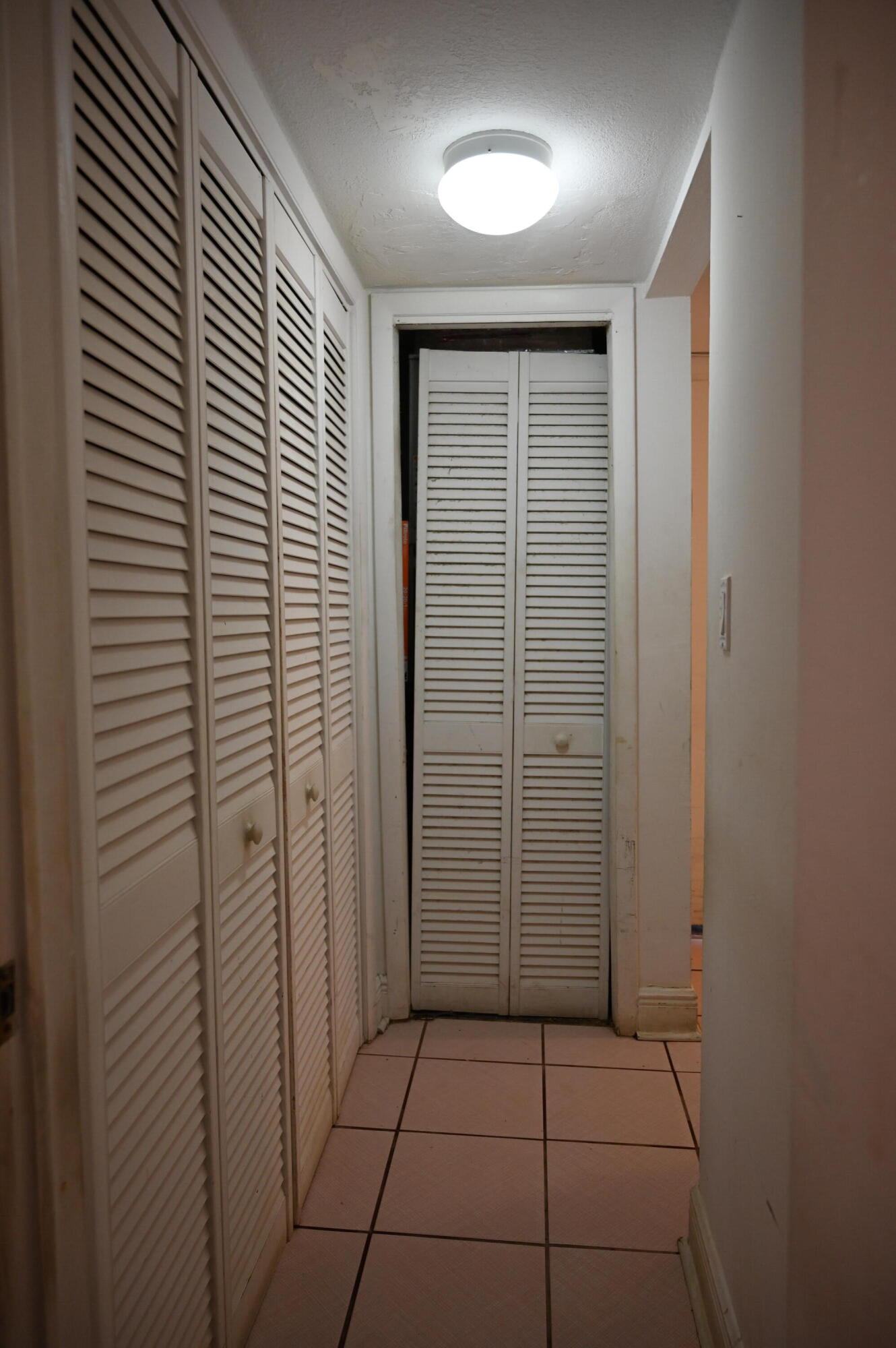 6215 West 20th Avenue, Unit 415 Hialeah, FL 33012 - Photo 24 of 39 a view of a hallway