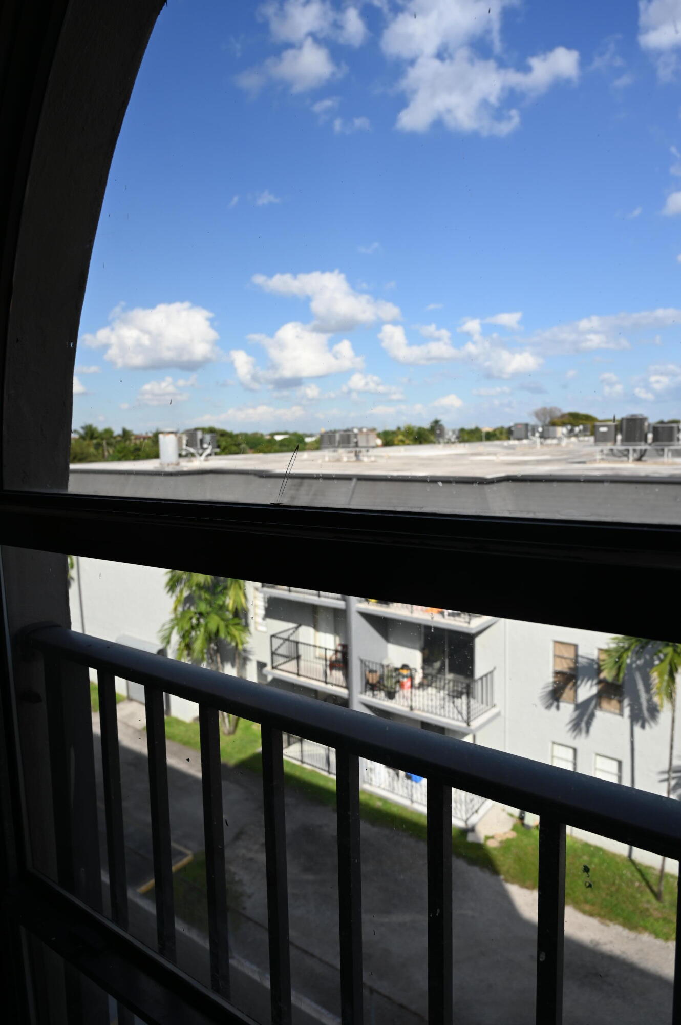 6215 West 20th Avenue, Unit 415 Hialeah, FL 33012 - Photo 37 of 39 a view of balcony with furniture