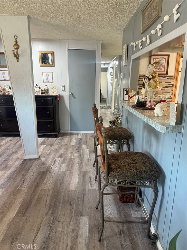 13393 Mariposa Road, Unit 97 Victorville, CA 92395 - Photo 11 of 32 a view of a dining room with furniture and window