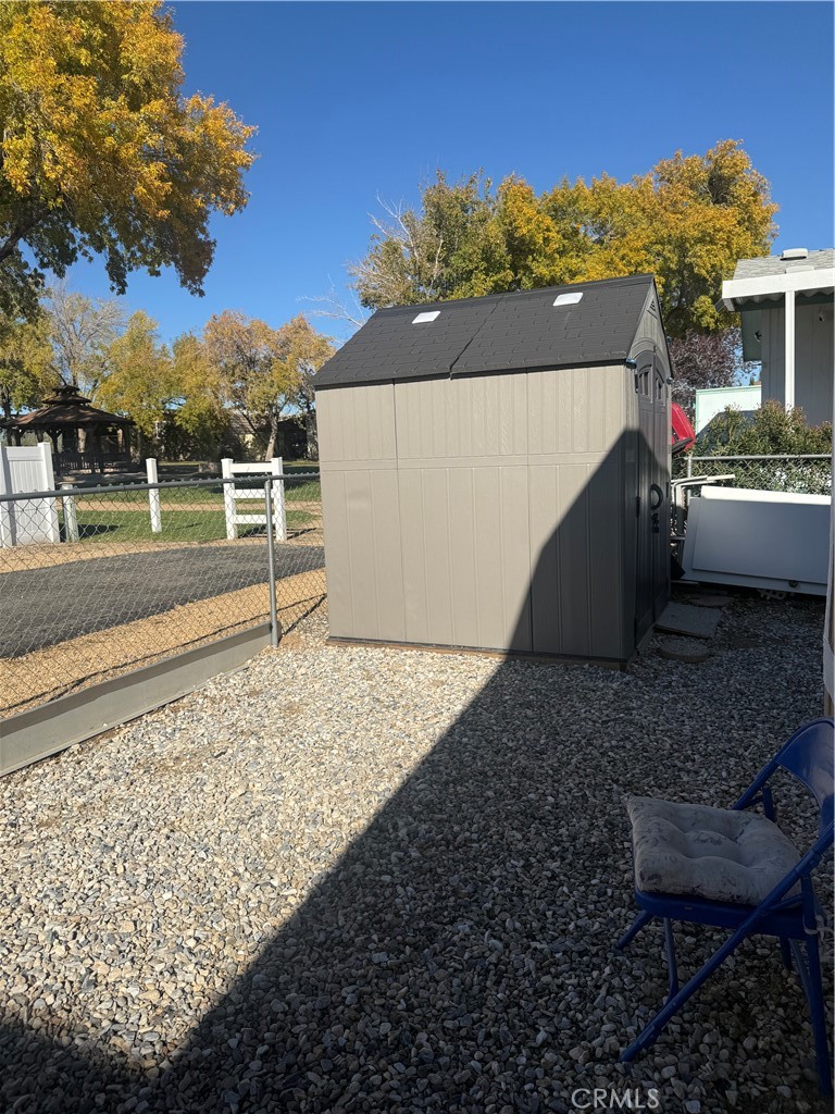 13393 Mariposa Road, Unit 97 Victorville, CA 92395 - Photo 27 of 32 a view of a backyard