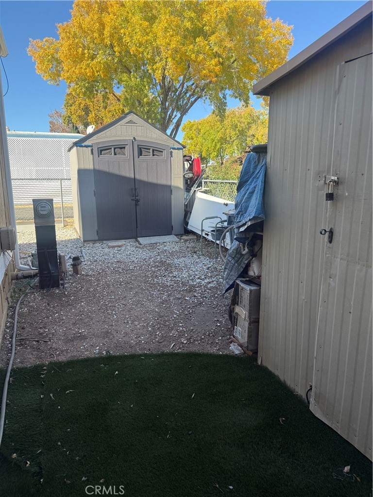 13393 Mariposa Road, Unit 97 Victorville, CA 92395 - Photo 28 of 32 a view of a back yard of the house