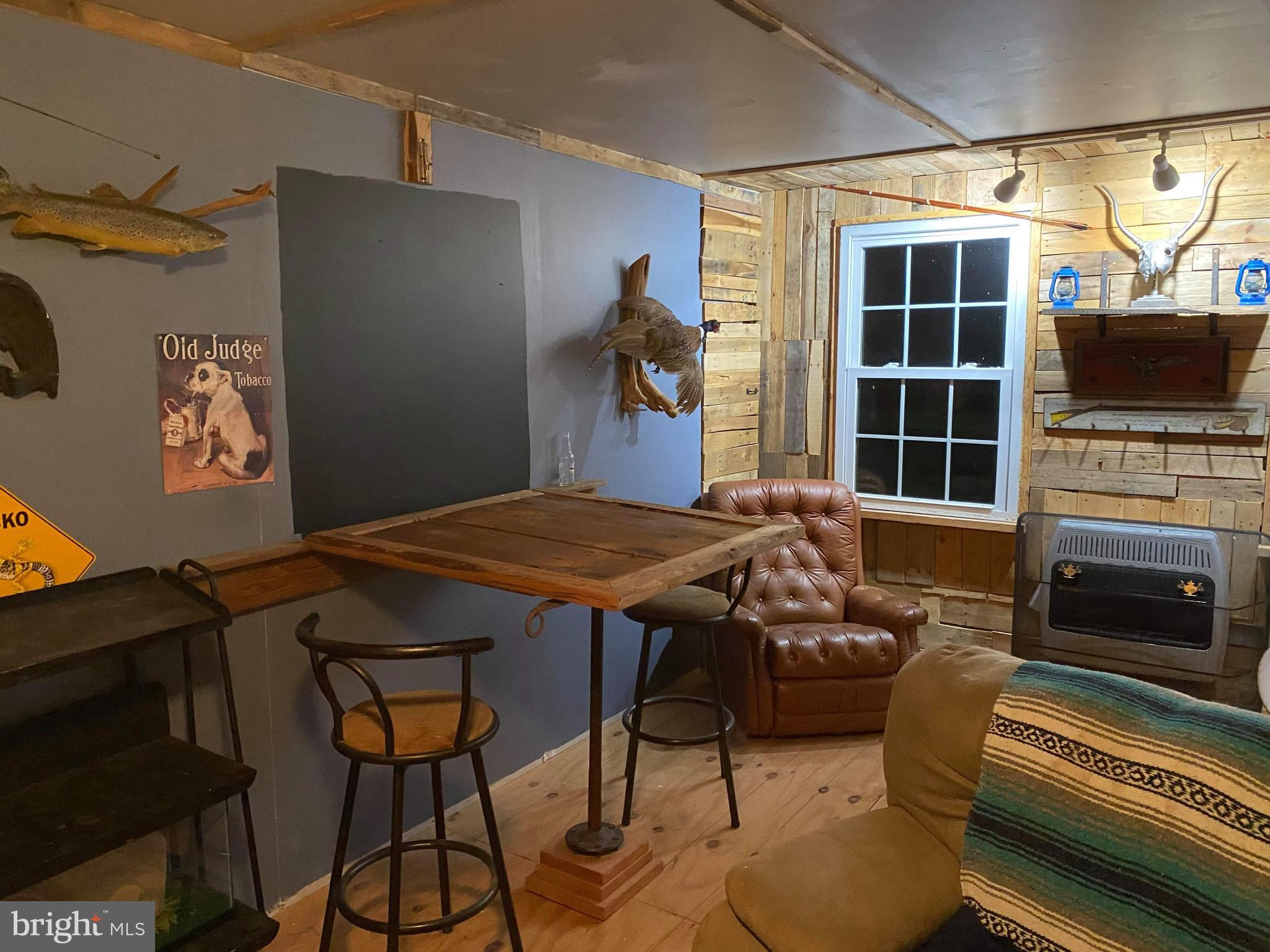 1775 Cemetery Road York, PA 17408 - Photo 13 of 59 a view of a livingroom with furniture and a fireplace