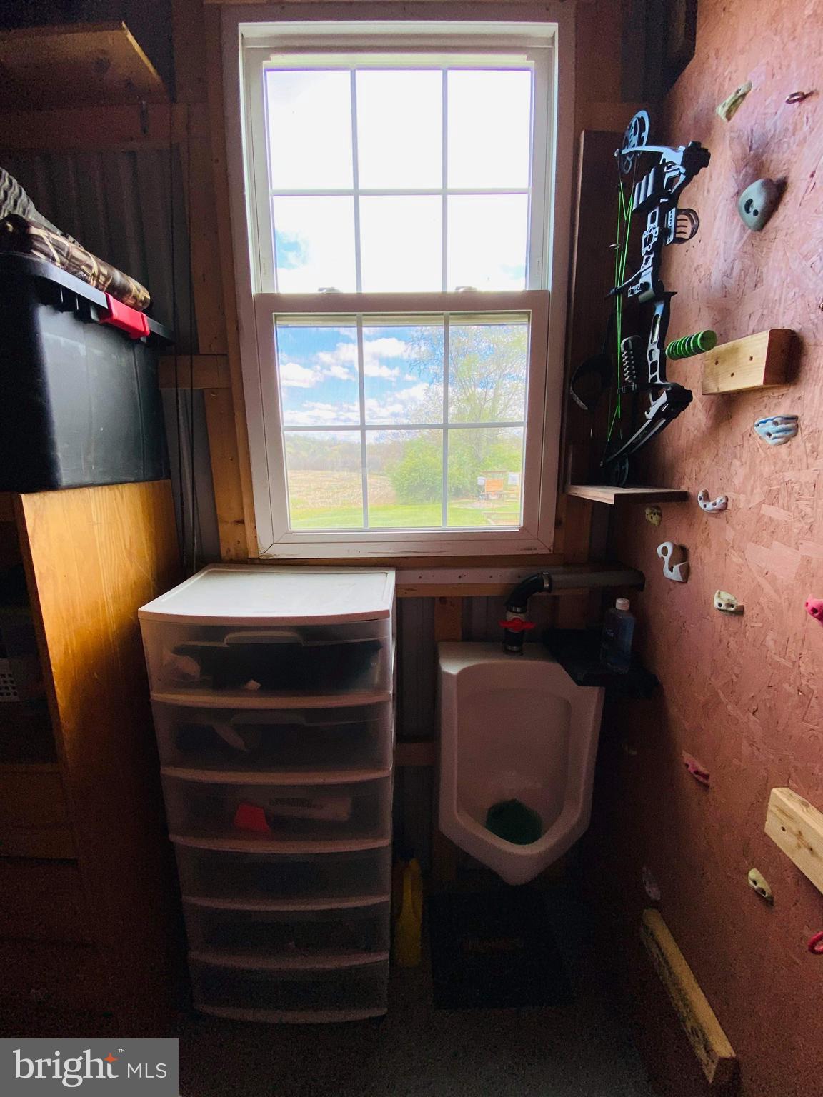 1775 Cemetery Road York, PA 17408 - Photo 32 of 59 a bathroom with a sink toilet and window