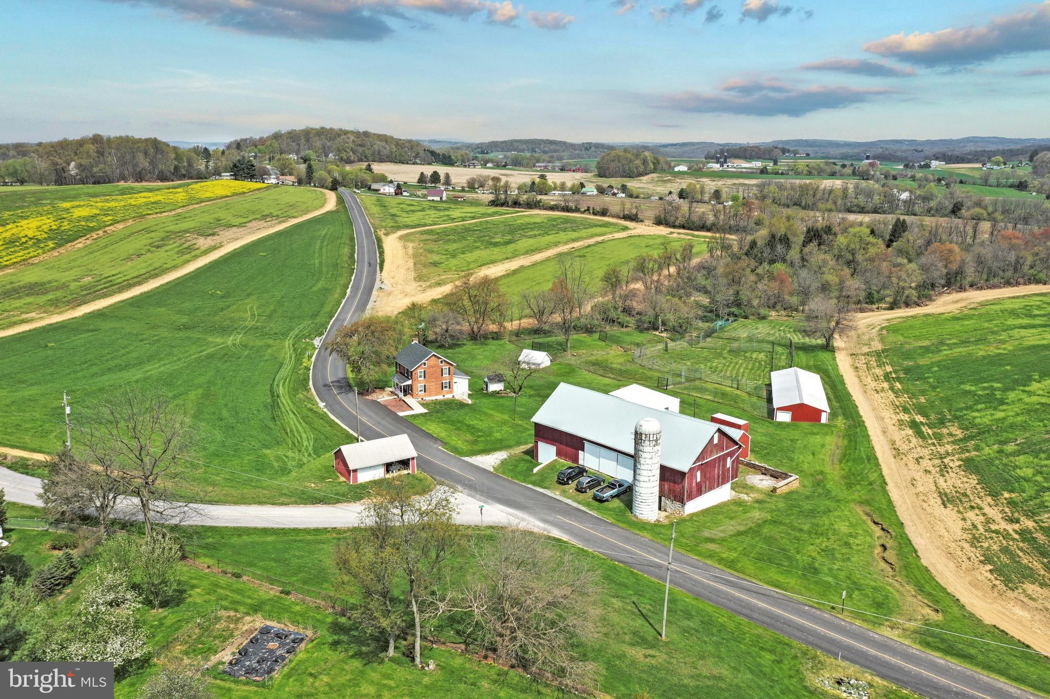 1775 Cemetery Road York, PA 17408 - Photo 47 of 59 an aerial view of a house with a garden