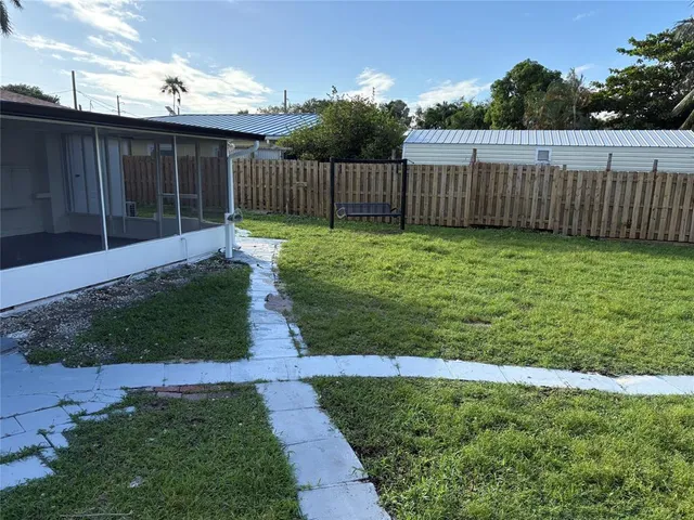a view of a backyard with a garden