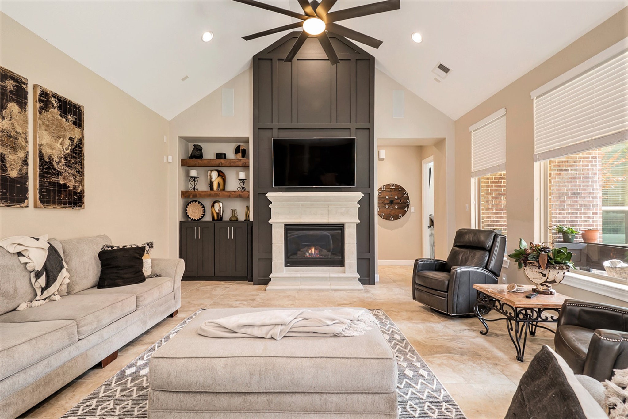 42 Sundown Ridge Place Tomball, TX 77375 - Photo 12 of 48 a living room with furniture a flat screen tv and a fireplace