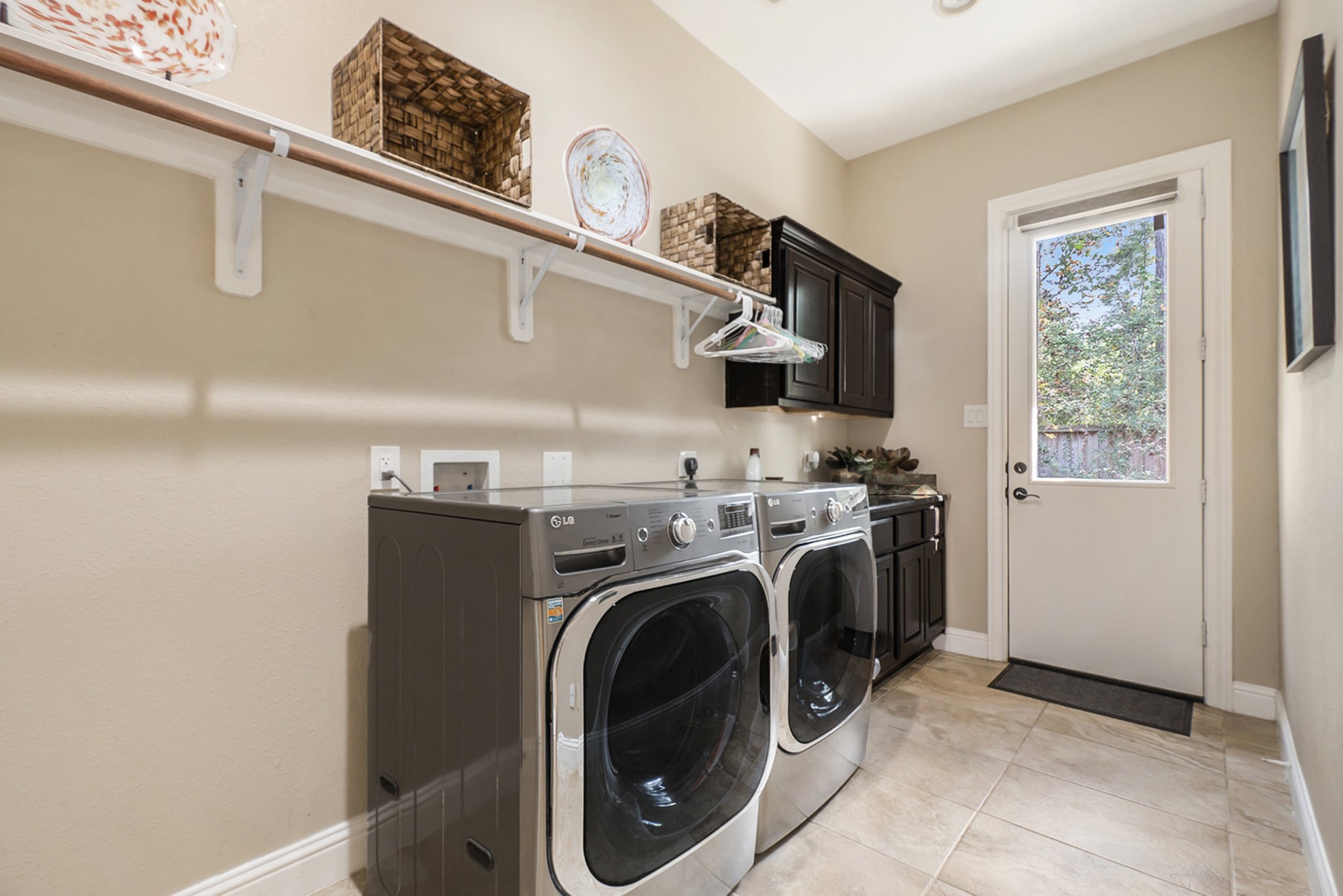 42 Sundown Ridge Place Tomball, TX 77375 - Photo 17 of 48 a utility room with dryer and washer