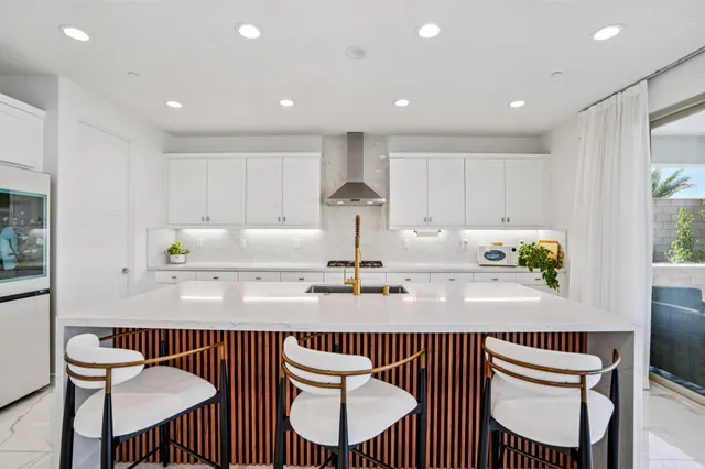 a bedroom with a bed and a desk