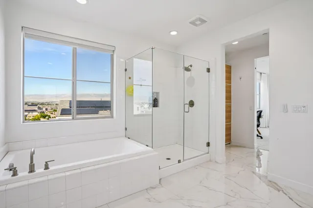 a view of living room with furniture and flat screen tv