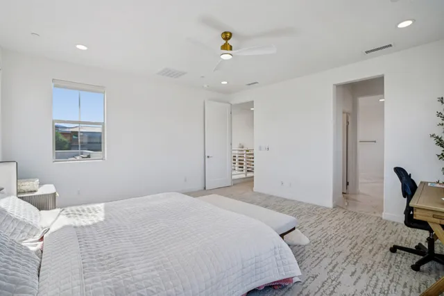 a bathroom with a toilet and a bathtub