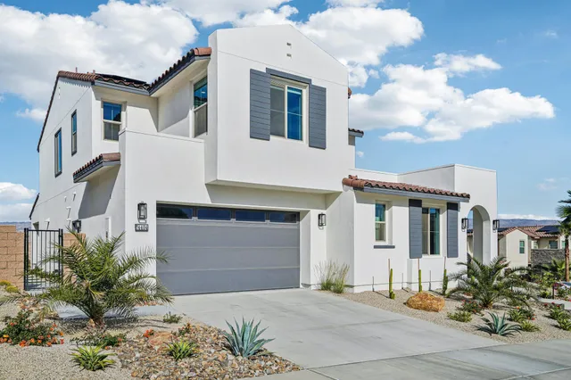 a building outdoor space with glass windows and furniture