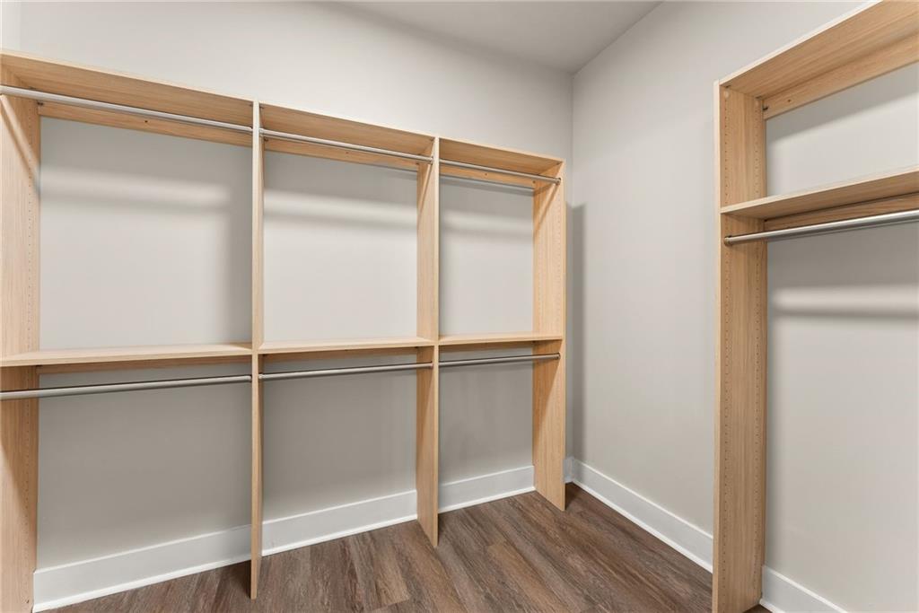 43 Anderson Street Jefferson, GA 30549 - Photo 23 of 45 a room with an empty walk in closet