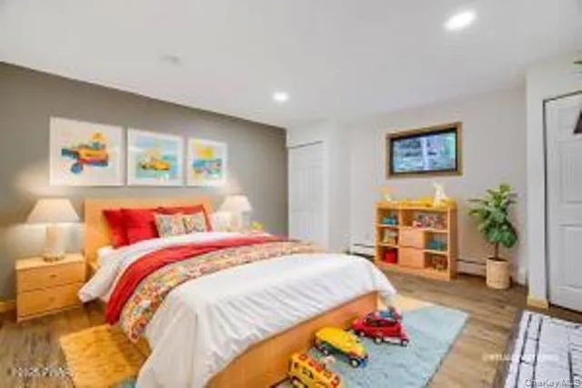 a bed room with a bed and a couch