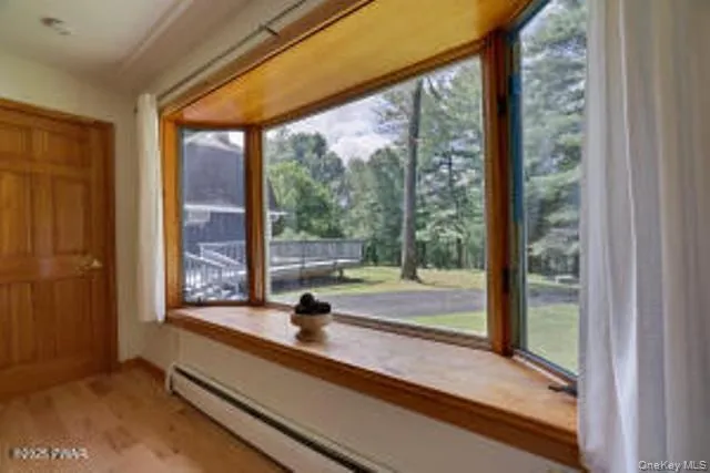 a view of a room and window