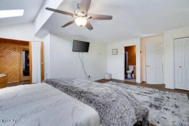 a bathroom with a tub and shower