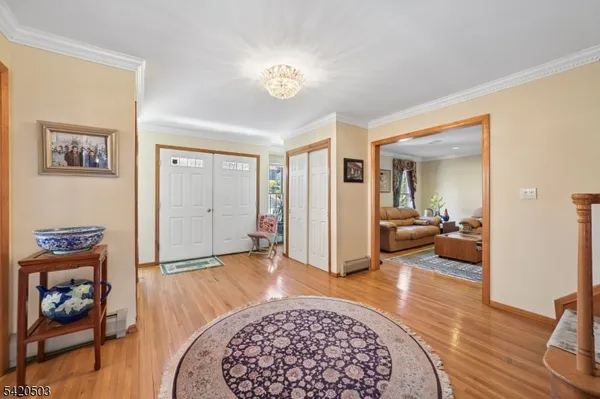 a living room with furniture and a rug