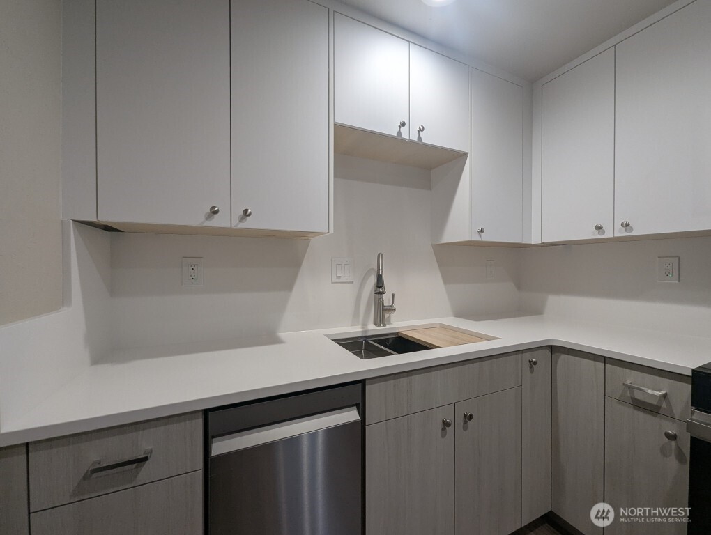 549 Elm Way Edmonds, WA 98020 - Photo 4 of 13 a kitchen with a sink and cabinets