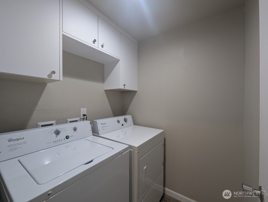 549 Elm Way Edmonds, WA 98020 - Photo 7 of 13 a utility room with dryer and washer