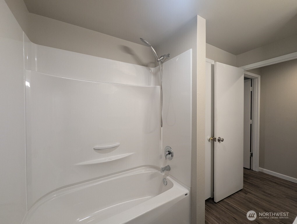 549 Elm Way Edmonds, WA 98020 - Photo 9 of 13 a bathroom with a bathtub