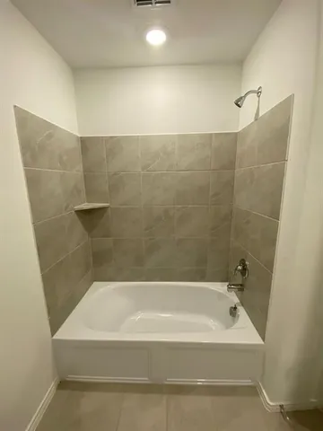a bathroom with a bathtub