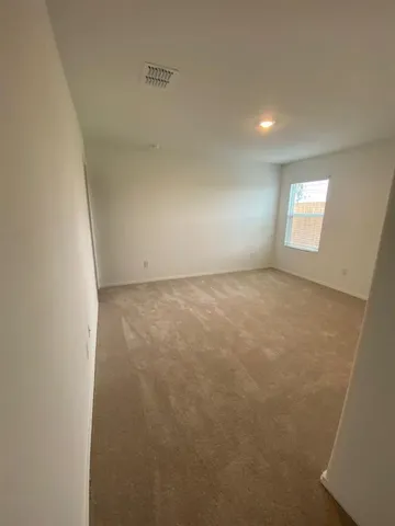 a view of a kitchen with a sink cabinets and a window