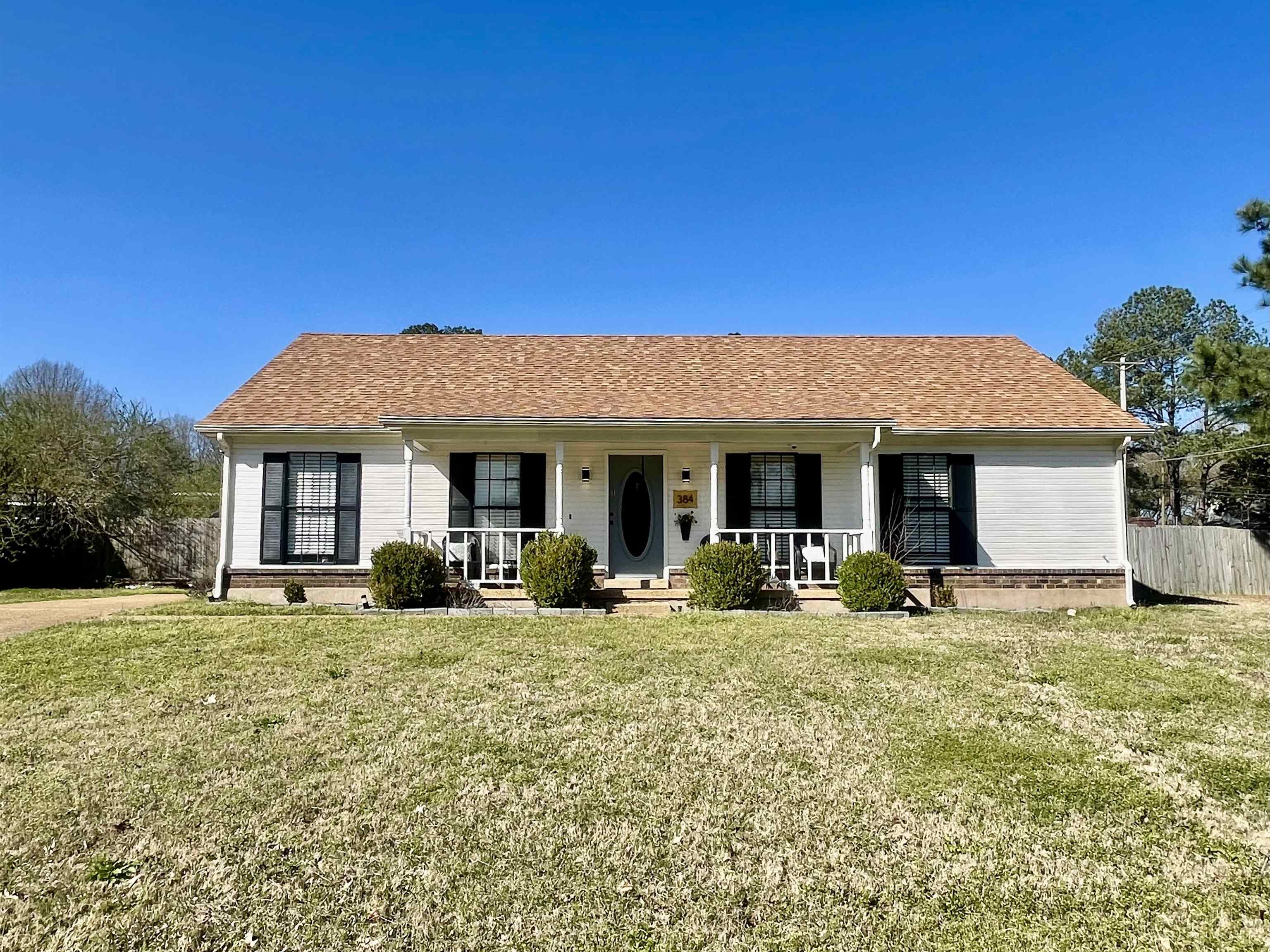 384 Fletcher Hollow Road Collierville, TN 38017 - Photo 1 of 17 a view of a house with yard porch and furniture