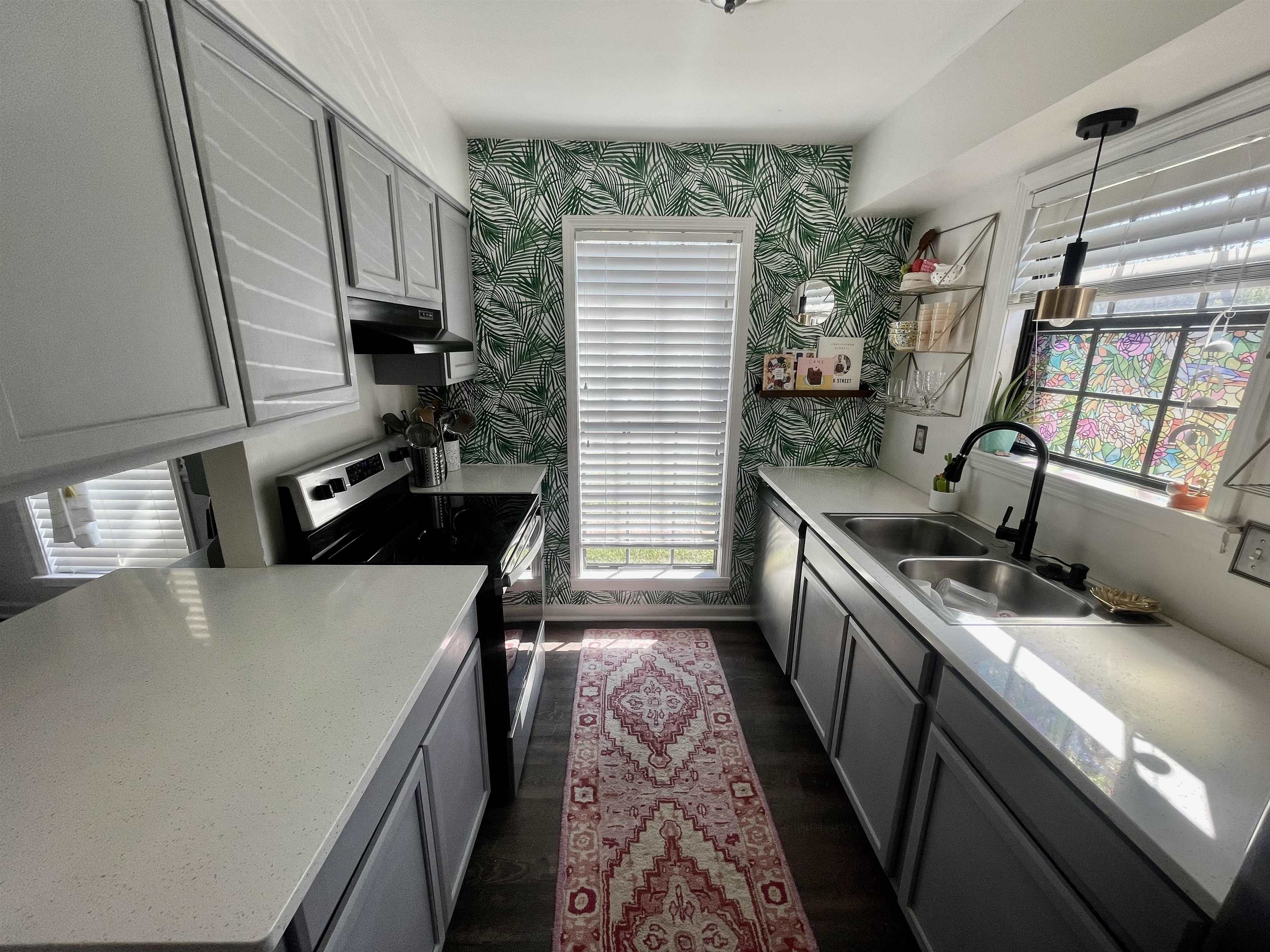 384 Fletcher Hollow Road Collierville, TN 38017 - Photo 11 of 17 a kitchen with a sink appliances and cabinets