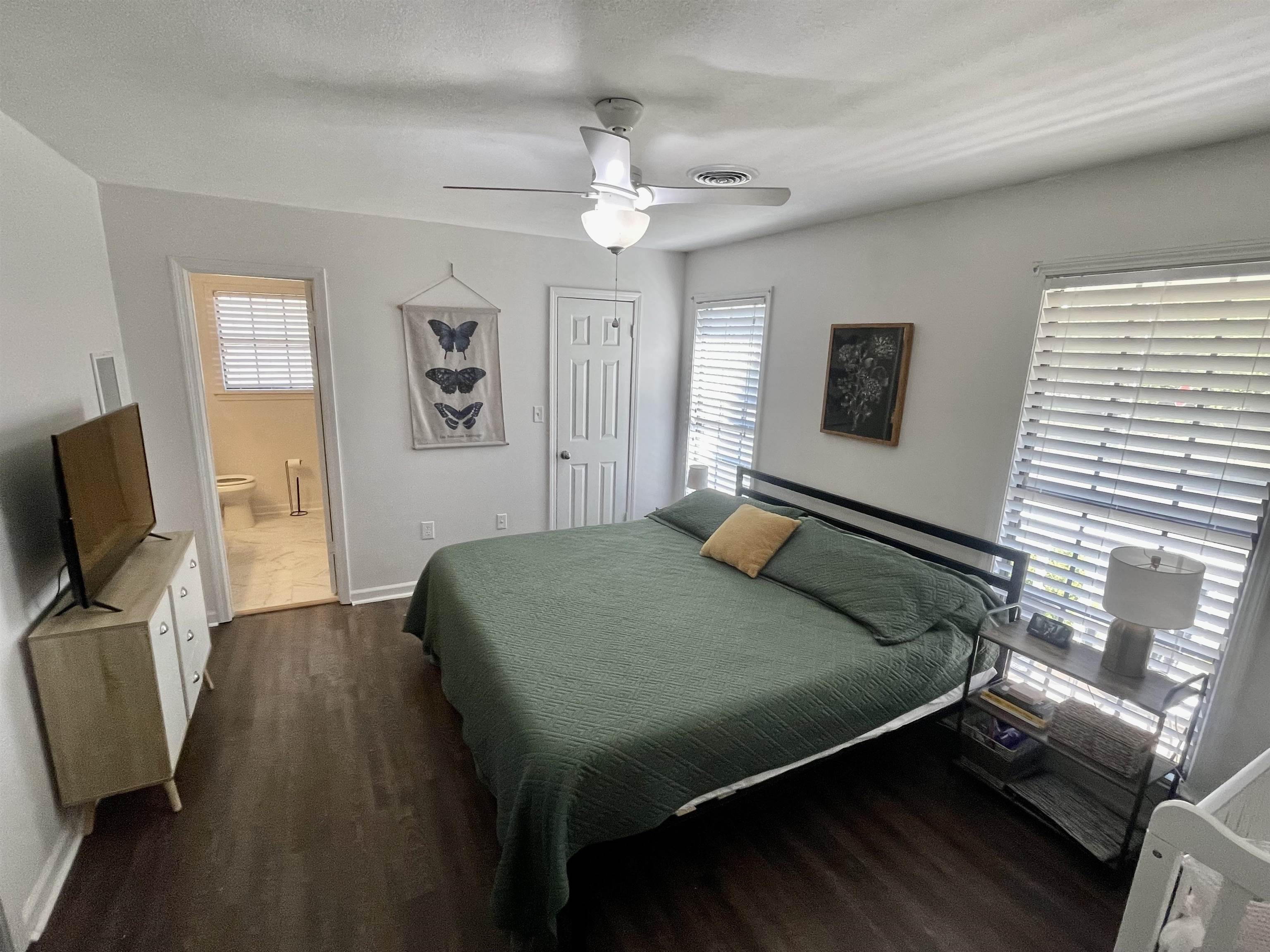384 Fletcher Hollow Road Collierville, TN 38017 - Photo 13 of 17 a bedroom with a bed and a flat screen tv