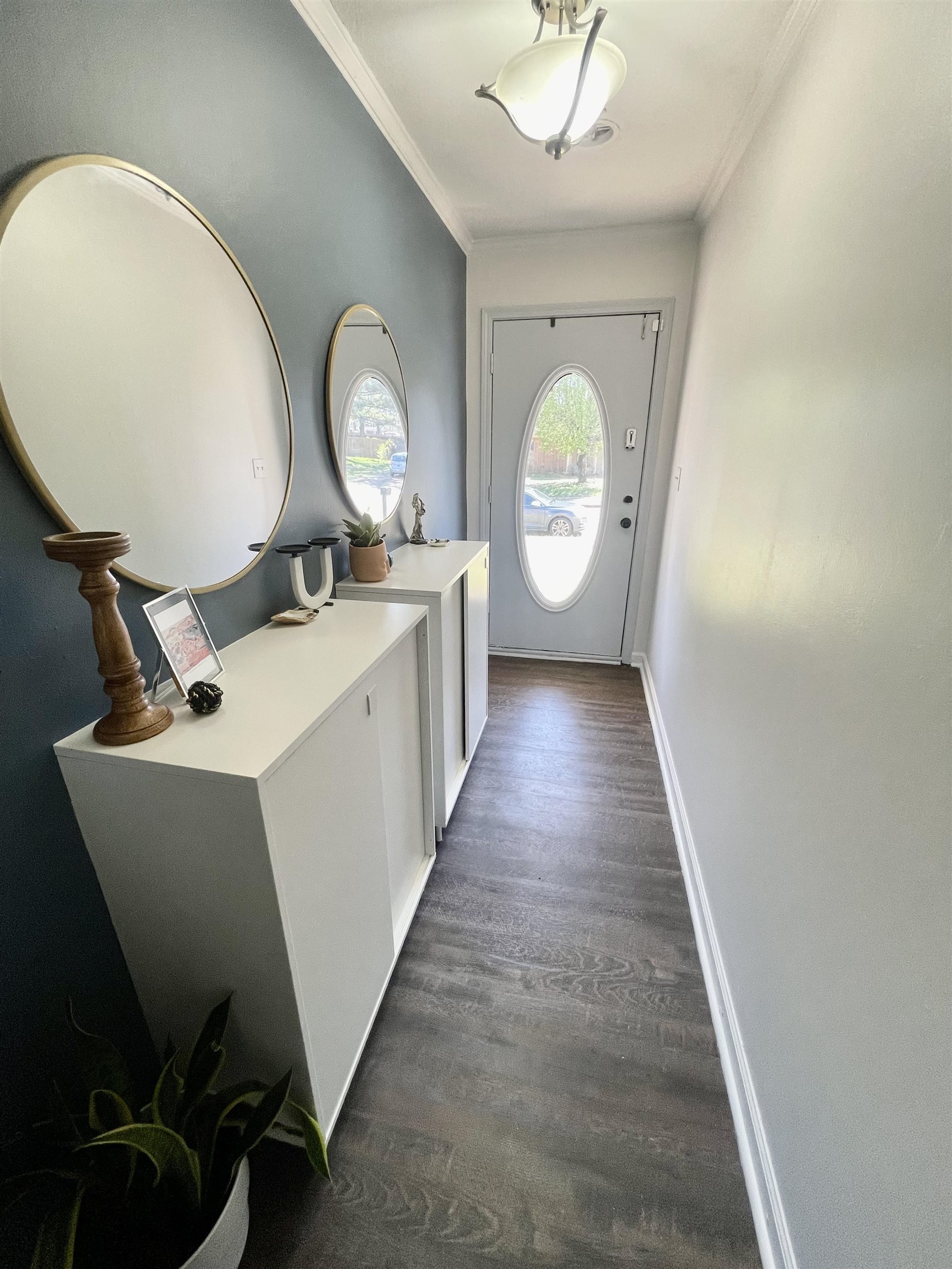 384 Fletcher Hollow Road Collierville, TN 38017 - Photo 2 of 17 a view of a hallway with wooden floor