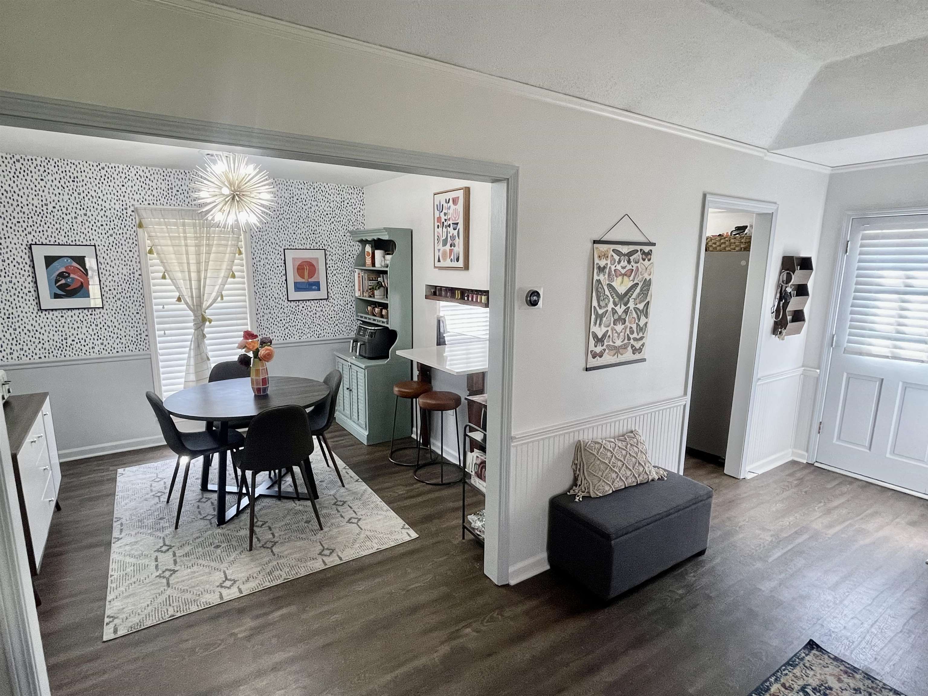 384 Fletcher Hollow Road Collierville, TN 38017 - Photo 5 of 17 a living room with furniture and a dining table with wooden floor
