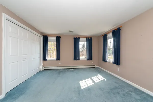 an empty room with windows