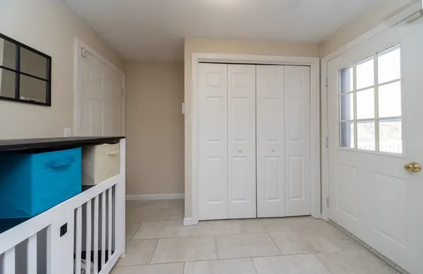 a view of a hallway with entryway