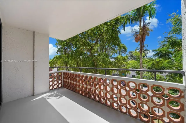 a view of a balcony with an outdoor space