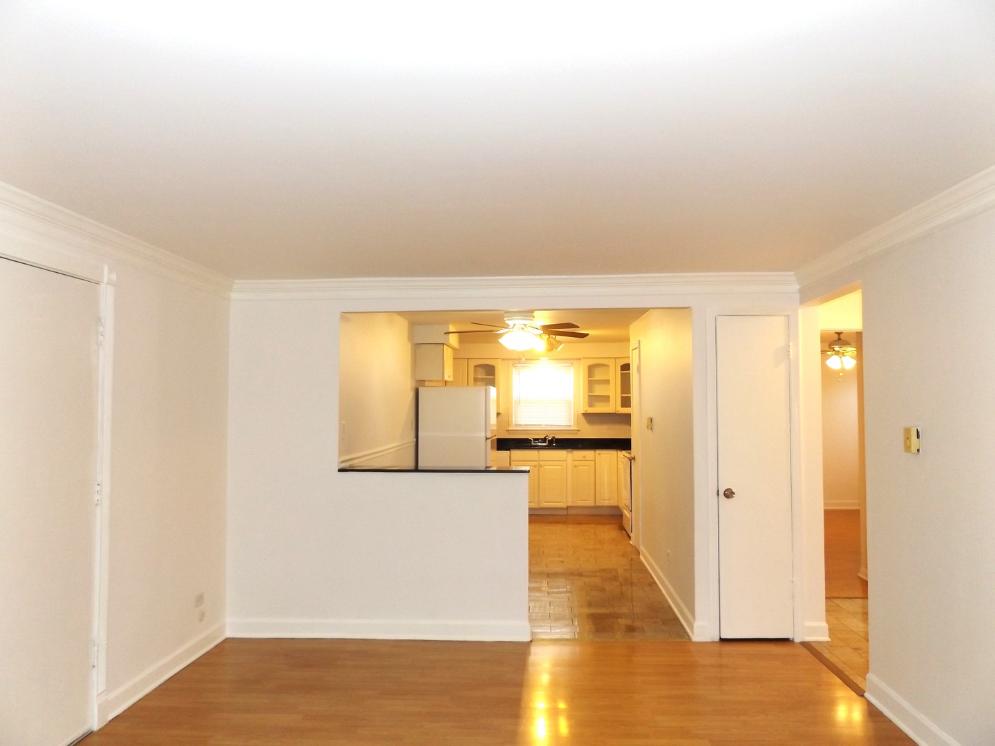 8751 West 79th Street, Unit 1 Justice, IL 60458 - Photo 16 of 32 a view of a room with wooden floor and a hallway