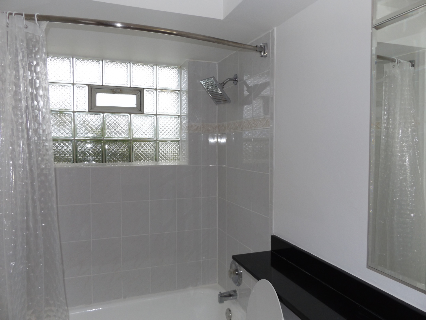 8751 West 79th Street, Unit 1 Justice, IL 60458 - Photo 24 of 32 a bathroom with a bathtub