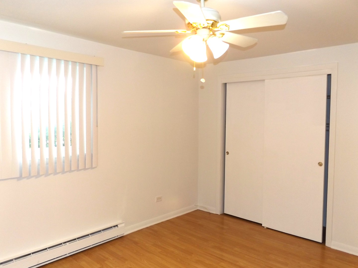8751 West 79th Street, Unit 1 Justice, IL 60458 - Photo 27 of 32 an empty room with a window