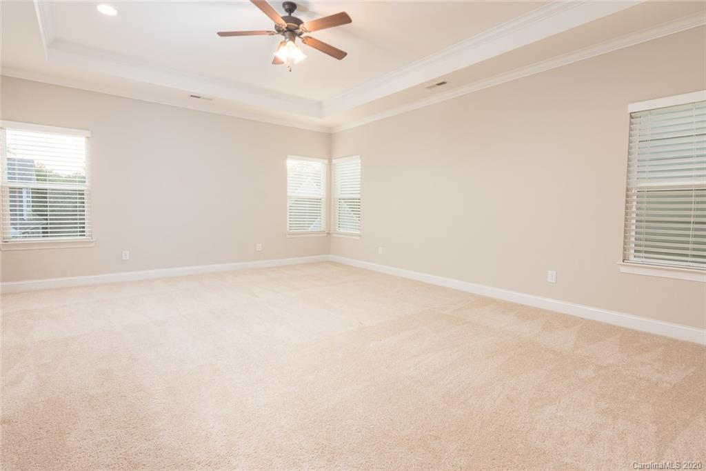 4736 Water Oak Road Charlotte, NC 28211 - Photo 11 of 45 a view of an empty room with a window