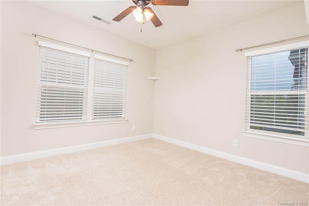 4736 Water Oak Road Charlotte, NC 28211 - Photo 12 of 45 a view of an empty room with a window