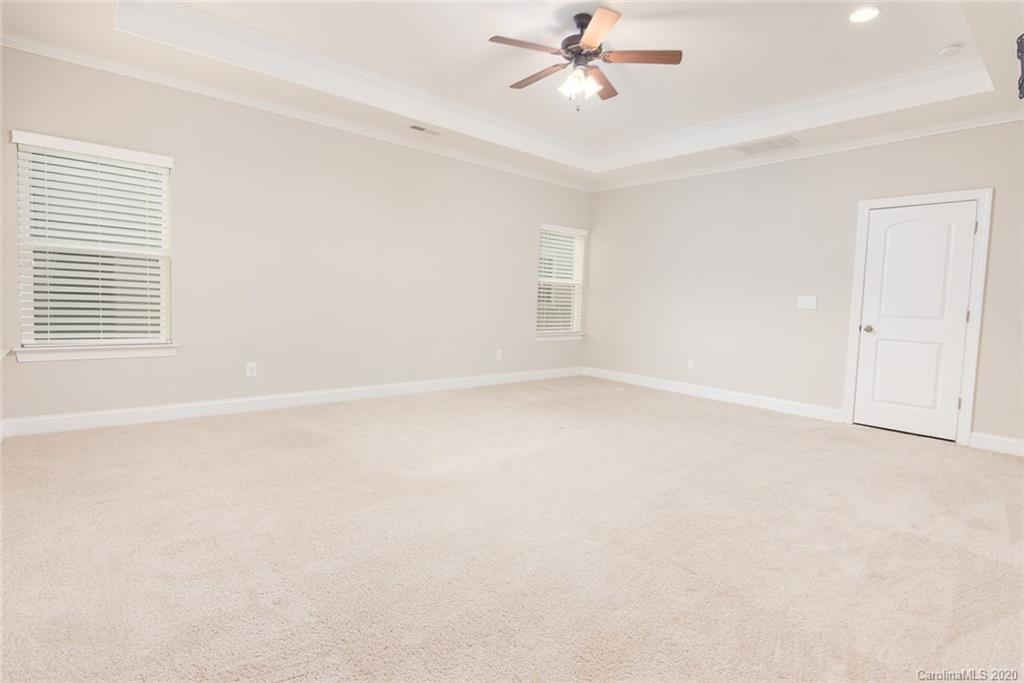 4736 Water Oak Road Charlotte, NC 28211 - Photo 13 of 45 a view of an empty room with a window