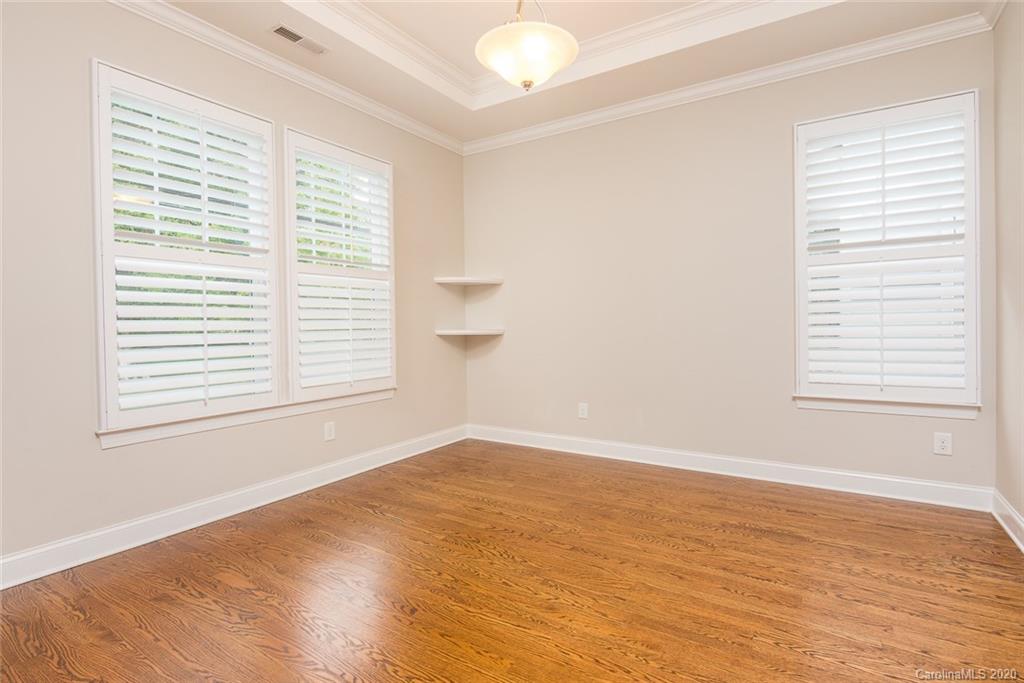 4736 Water Oak Road Charlotte, NC 28211 - Photo 16 of 45 a view of an empty room with a window