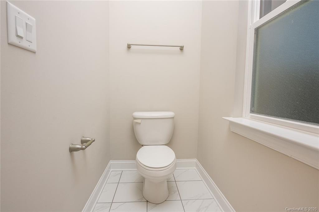 4736 Water Oak Road Charlotte, NC 28211 - Photo 27 of 45 a bathroom with a toilet