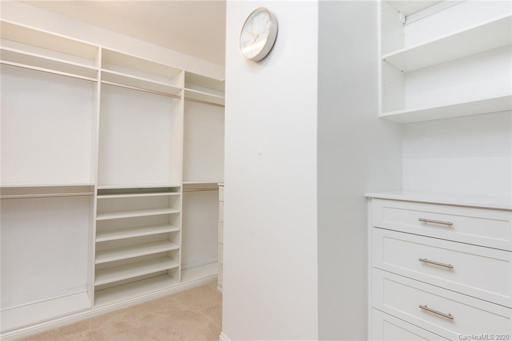 4736 Water Oak Road Charlotte, NC 28211 - Photo 30 of 45 a view of walk in closet with empty racks