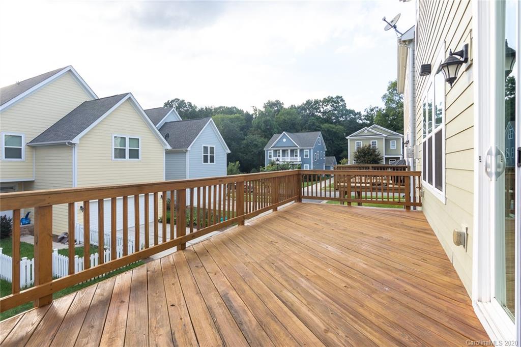 4736 Water Oak Road Charlotte, NC 28211 - Photo 39 of 45 a view of a house with wooden deck