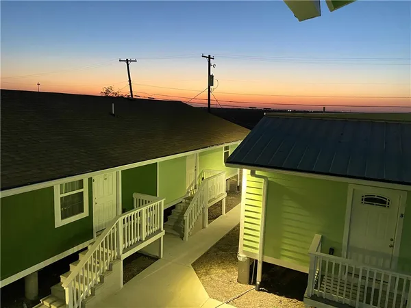 a view of a balcony with an outdoor space